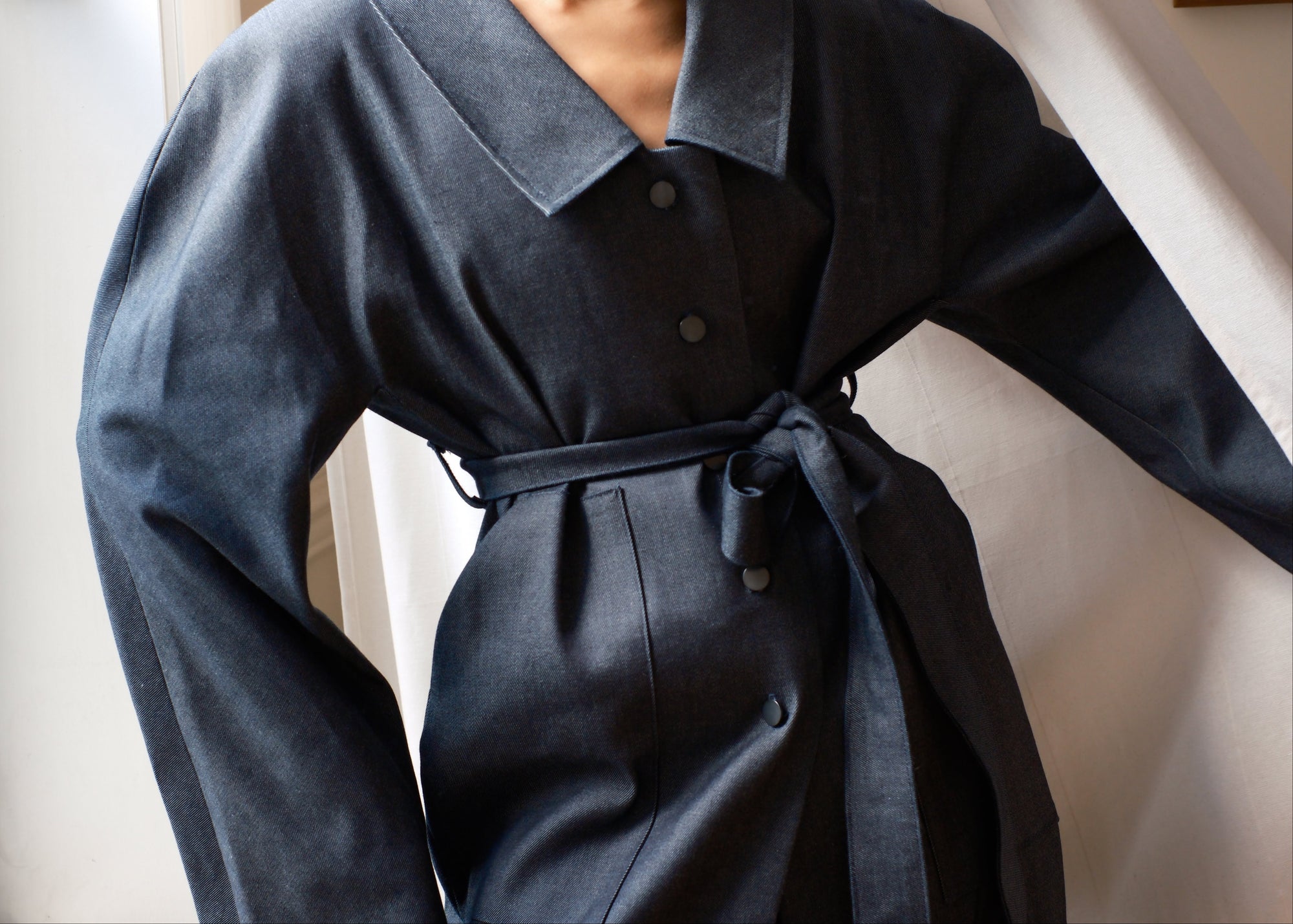 Sculptural denim trench