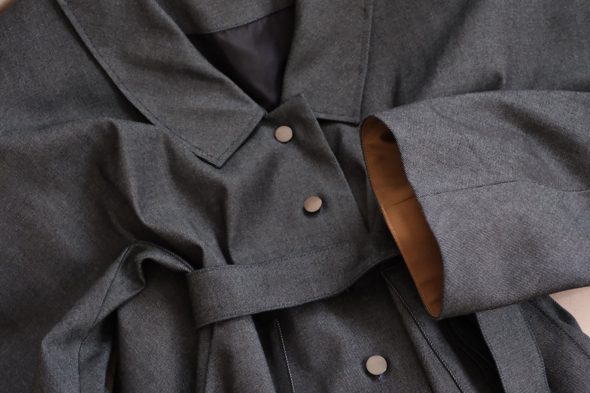 Sculptural denim trench