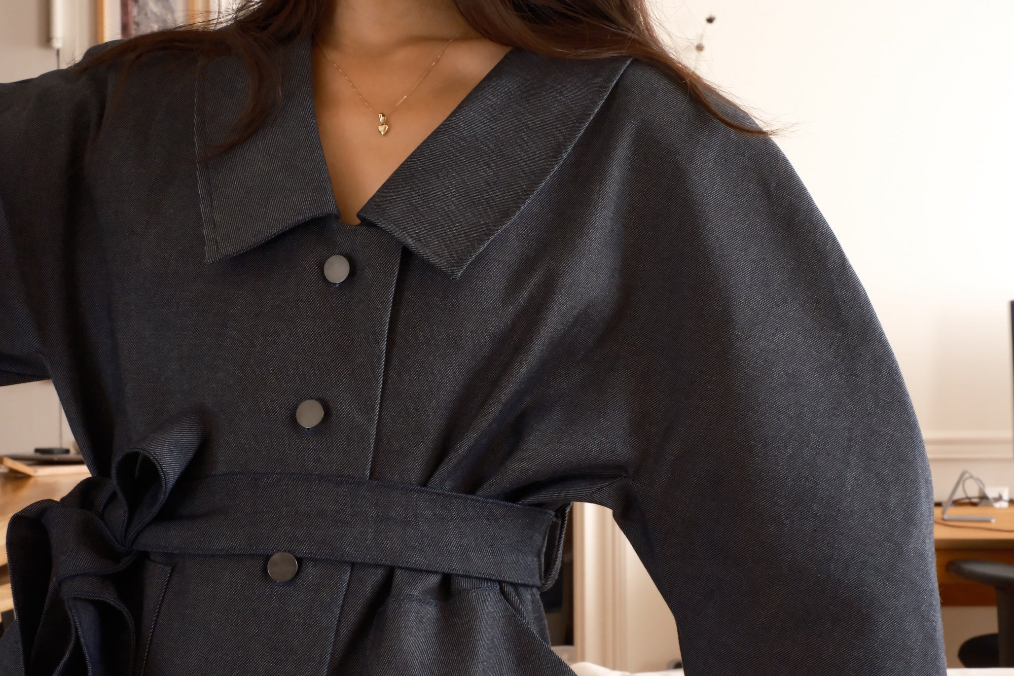 Sculptural denim trench