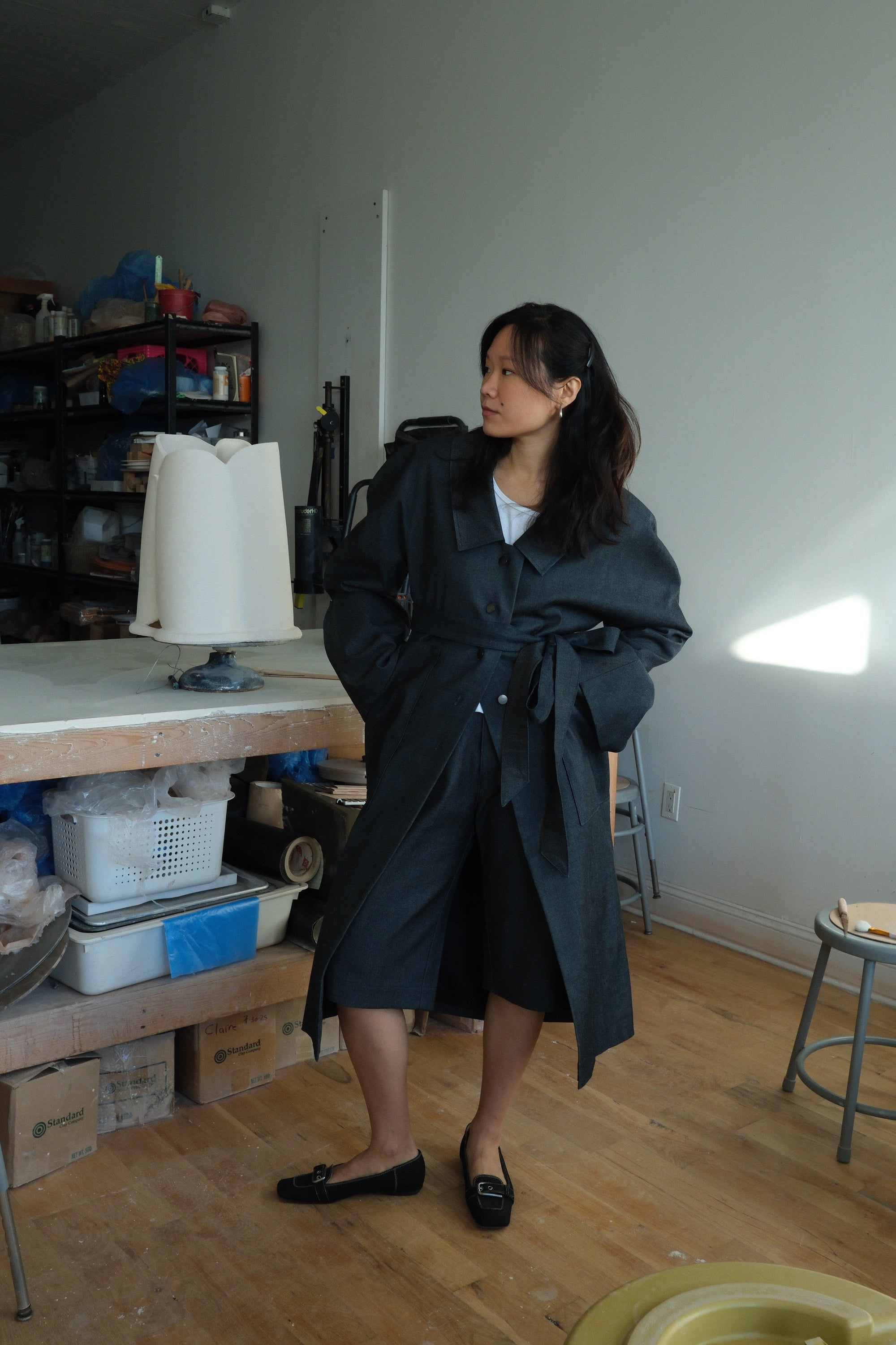 Bluestone sculptural denim trench